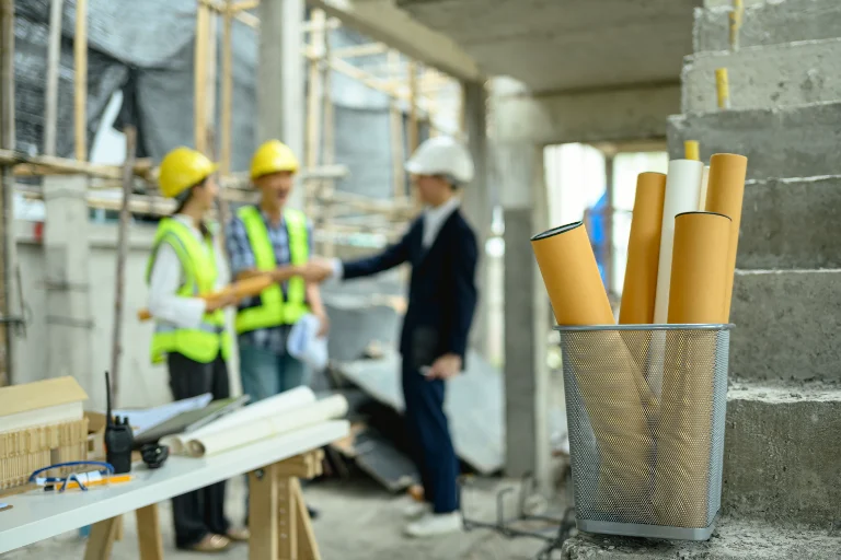 Architects collaborating on construction plans